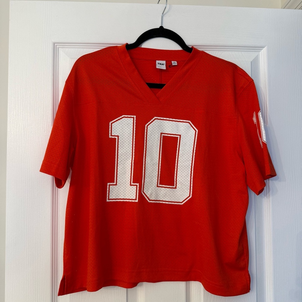 TNA Aritzia EndGame Red Jersey with Number 10